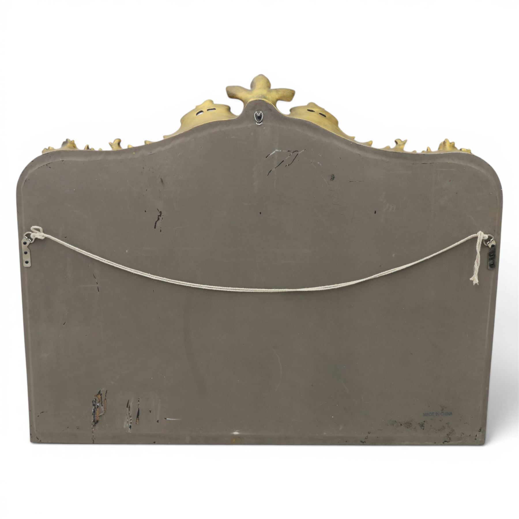 Rococo design rectangular wall mirror, featuring shaped top with shell pediment, leaves and scrolling decoration