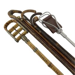 Early 20th century bamboo & metal French shooting stick, the mount stamped Bte. SGDG, together with other various walking sticks and canes