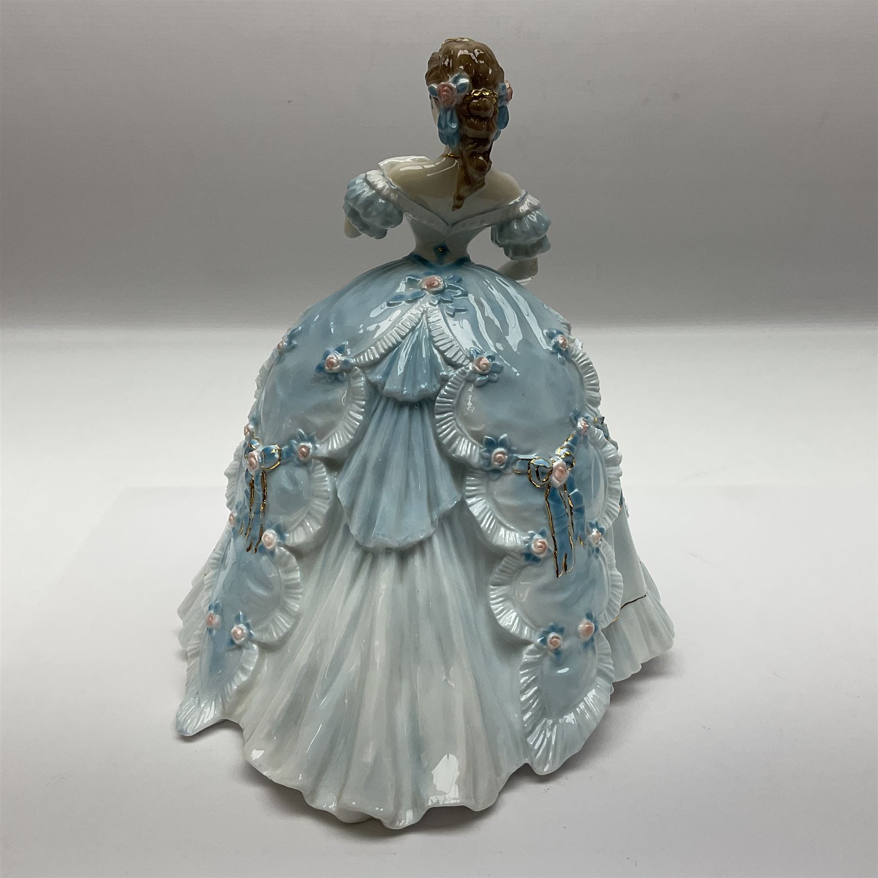 Three Royal Worcester figurines,  The First Quadrille, The Fairest Rose and Queen of Hearts, largest H21cm