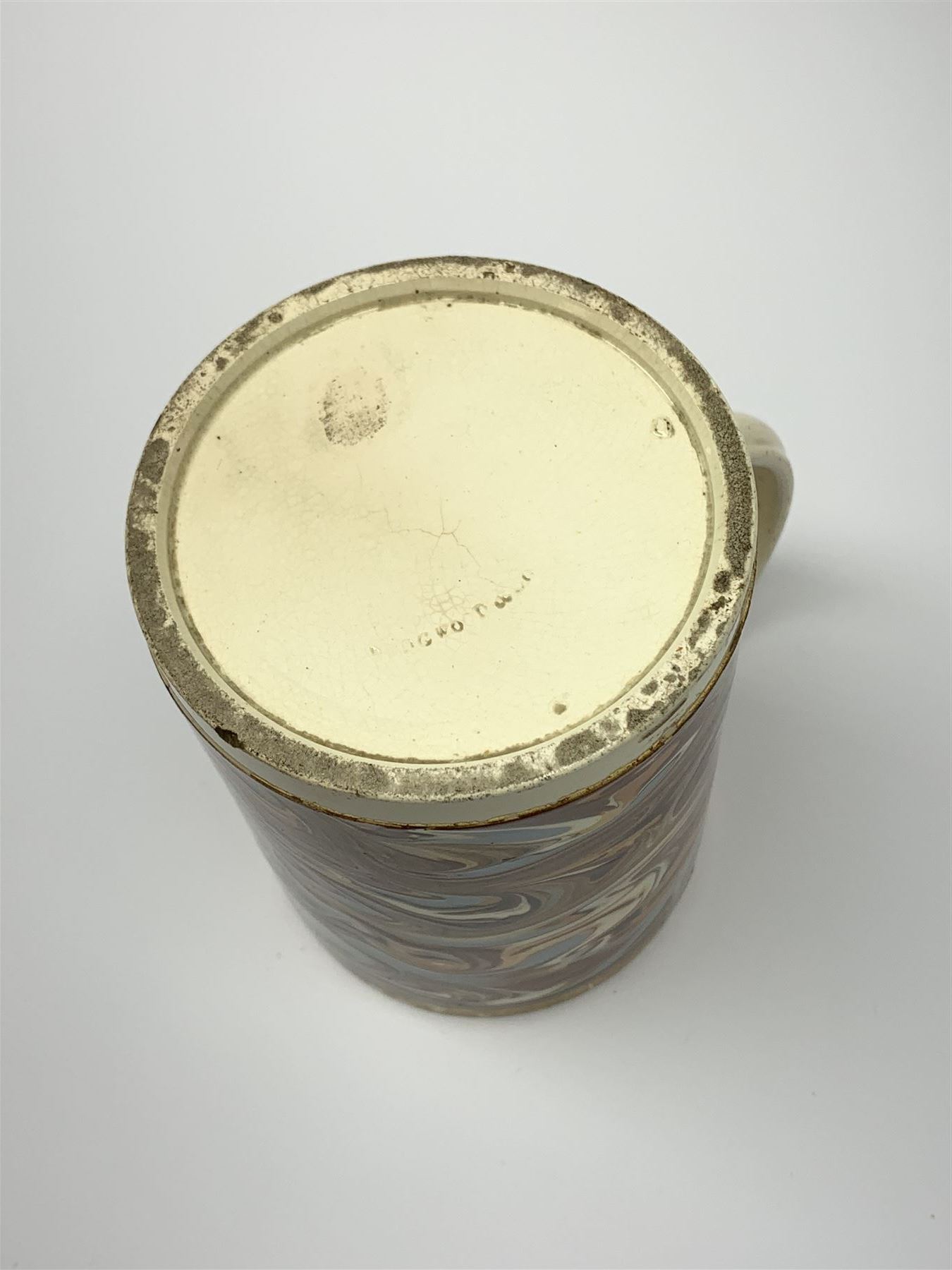 Late 18th century earthenware mug, possibly Ralph Wedgwood, Burslem or Ferrybridge, with surface marbled decoration and later gilt detail to rims and handle, impressed beneath Wedgwood & Co, H12cm