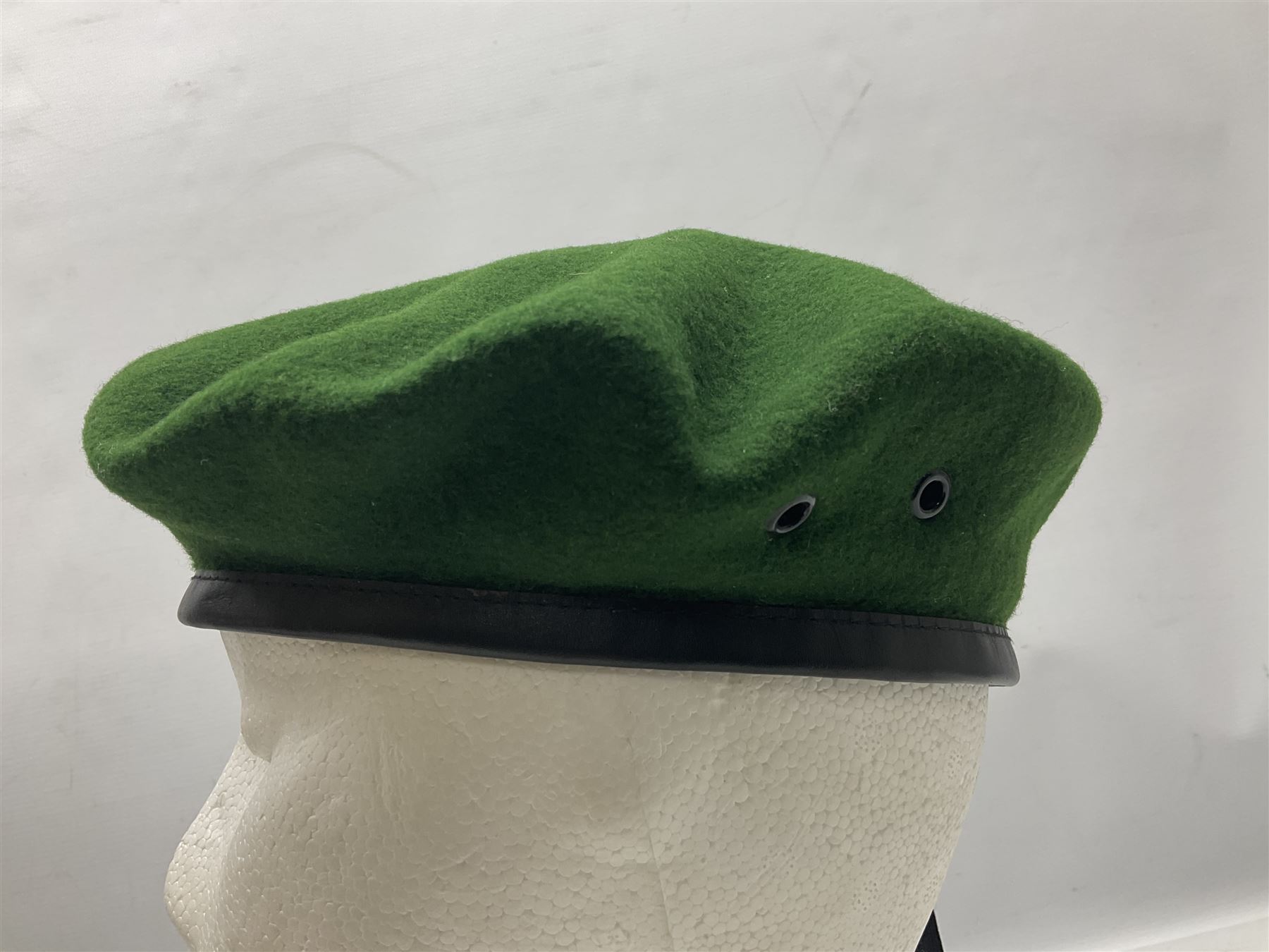 Four paratrooper berets - Russian, Italian, British and Foreign Legion; all with badges (4)