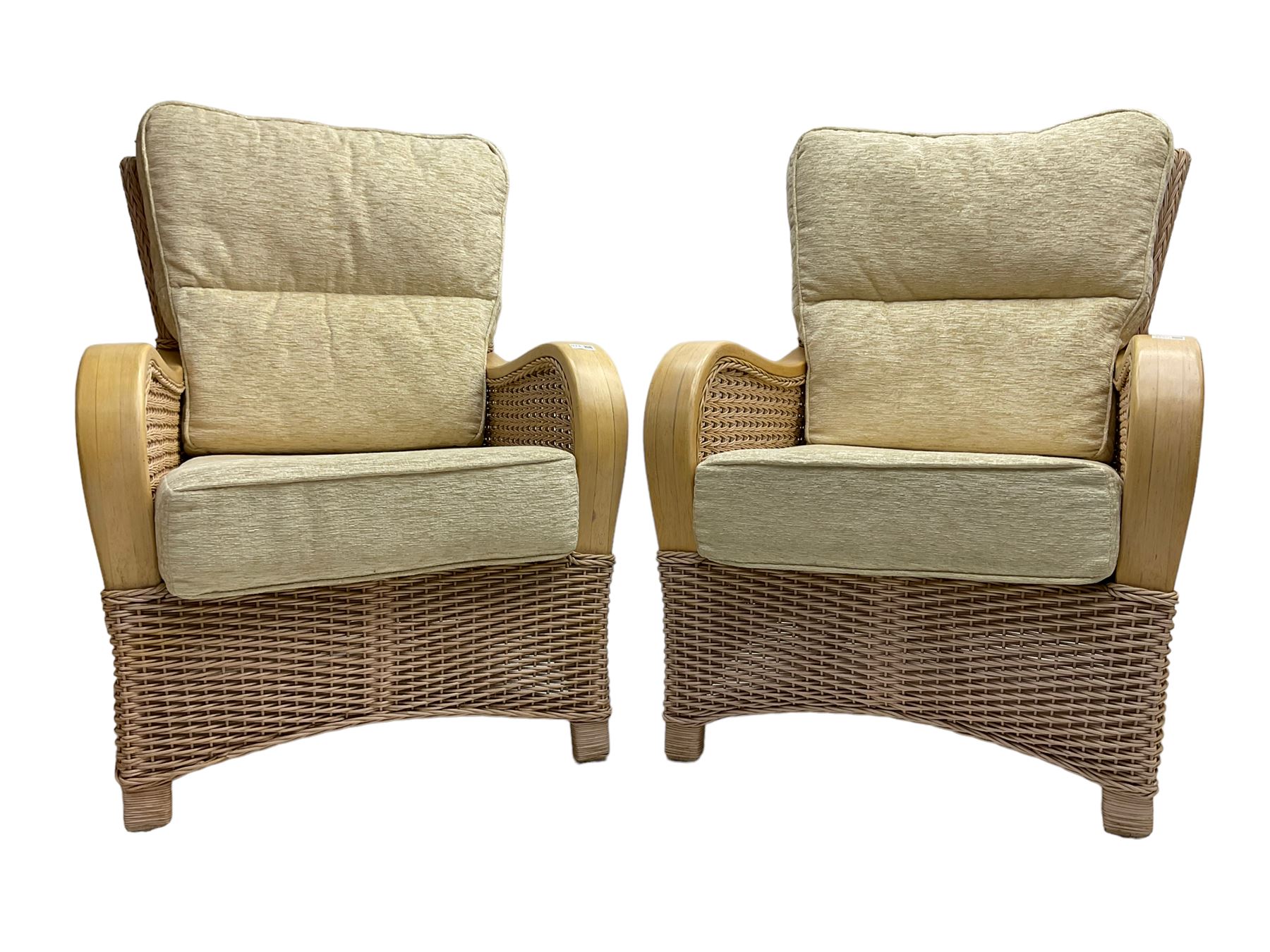 Contemporary rattan conservatory suite - two seat sofa with wicker frame and loose cushions upholstered in textured champagne fabric (W125cm H98cm); pair of matching armchairs (W72cm H98cm); rectangular glass-topped coffee table with rattan frame and undertier (W85cm D60cm H47cm); and matching square side table (W53cm H55cm)