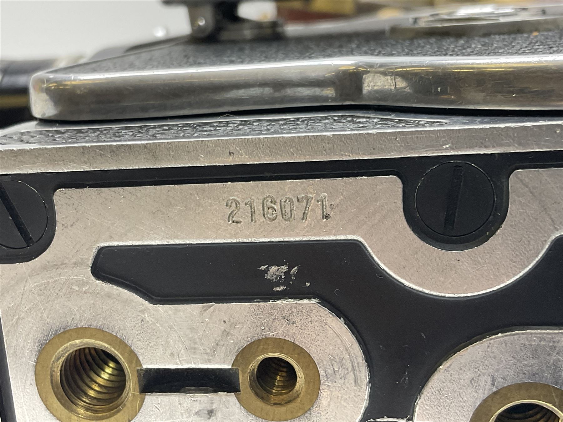 Paillard Bolex H8 RX4 cine camera body with turret for interchangeable lenses, serial no. 216071, with 'Macro Switar H8RX f1.4 36mm' lens, serial no.863406, 'Macro Switar H8RX f1.3 12.5mm' lens, serial no. 865770, 'Switar H8RX f1.6 5.5mm' lens, serial no. 937691 and RX fader, in fitted leather case