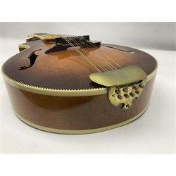 F-hole eight-string mandolin with one-piece maple back and ribs and spruce top L70cm
