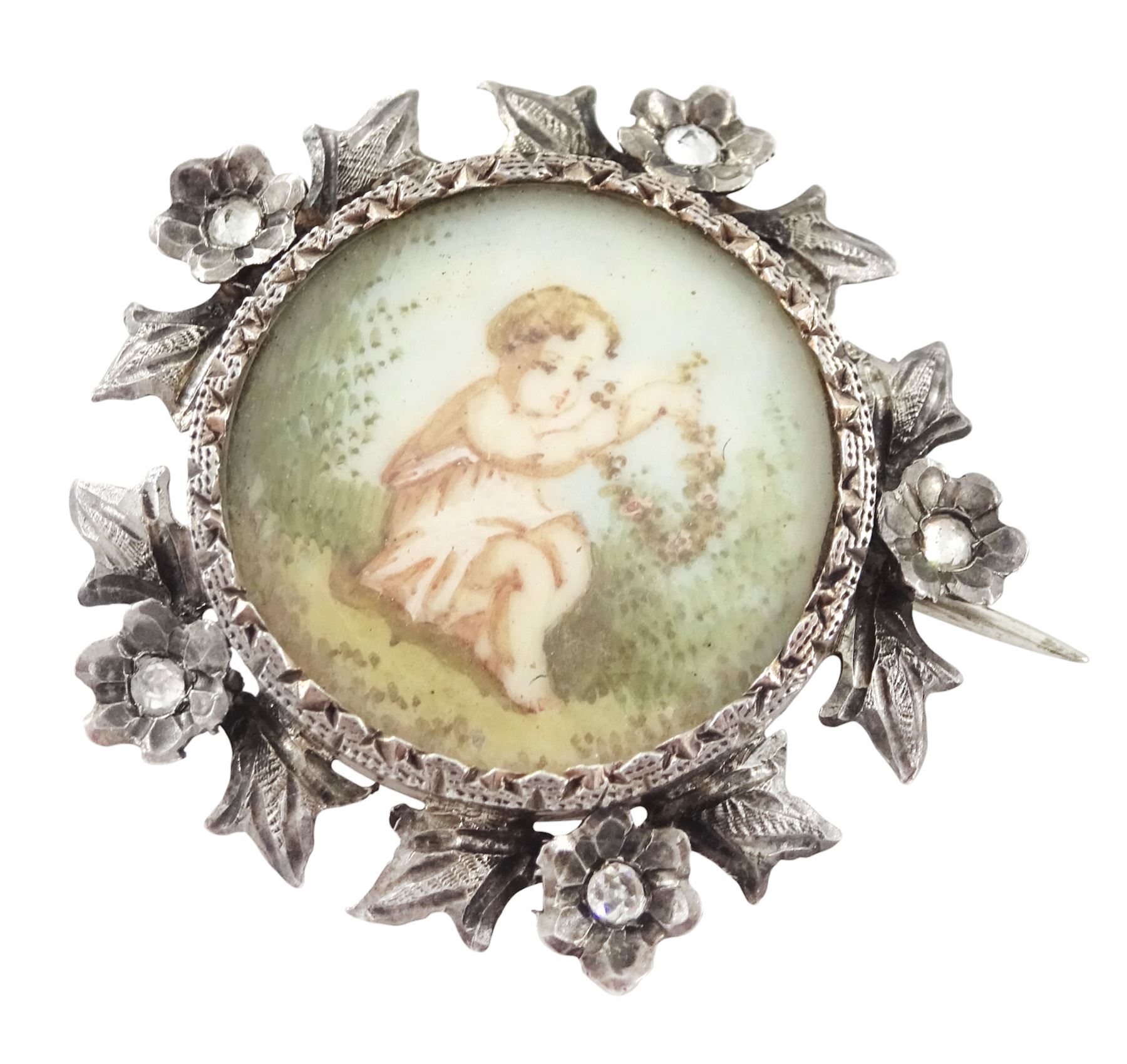 Five 19th century silver portrait brooches, two set with portraits of cherubs and three with women on ivory, three within pierced foliate surrounds. This lot has been registered for sale under Section 10 of the APHA Ivory Act