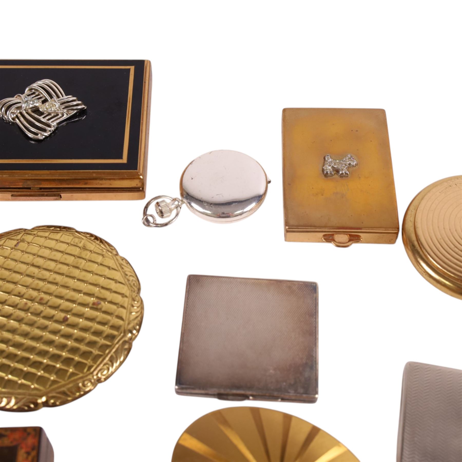 Collection of vintage compact mirrors, pill boxes and vanity cases, including Agme, Coty and Flamingo examples