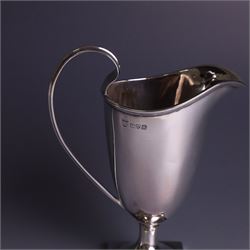 Edwardian silver helmet shaped cream jug, with plain bowl and upon a square base, hallmarked D & M Davis , Chester 1901, H13cm
