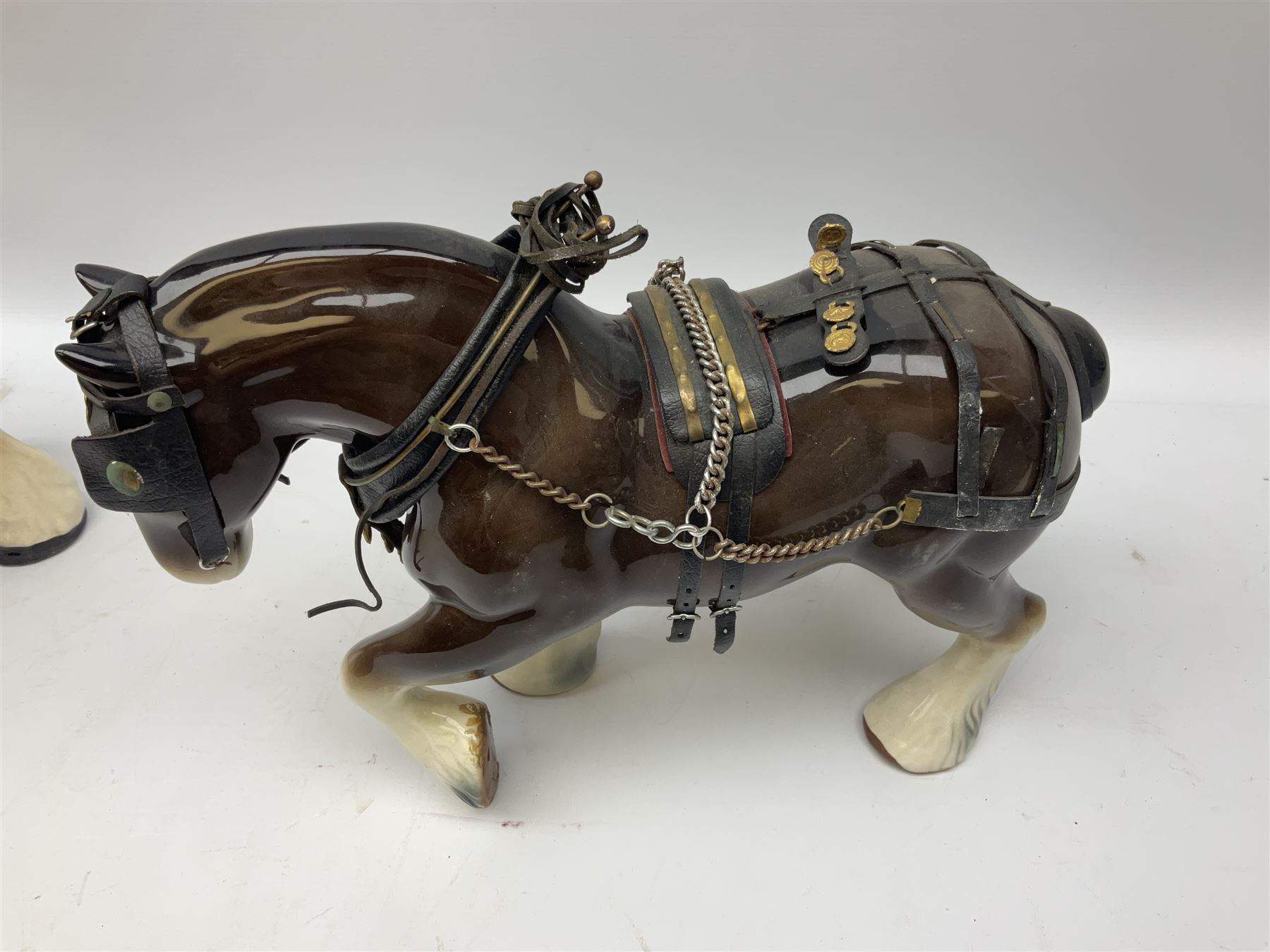 Four Melba Ware Shire horse figures and another similar, and three wood carts