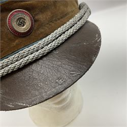 WW2 German Political Leaders brown cloth visor cap with metal insignia; labelled K. Hartel Weiden