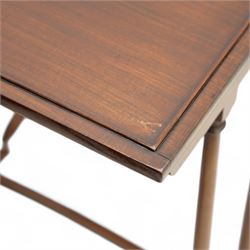 Early 20th century mahogany quartetto nest of four occasional tables, each with rectangular top with raised lip moulding, turned supports on splayed feet