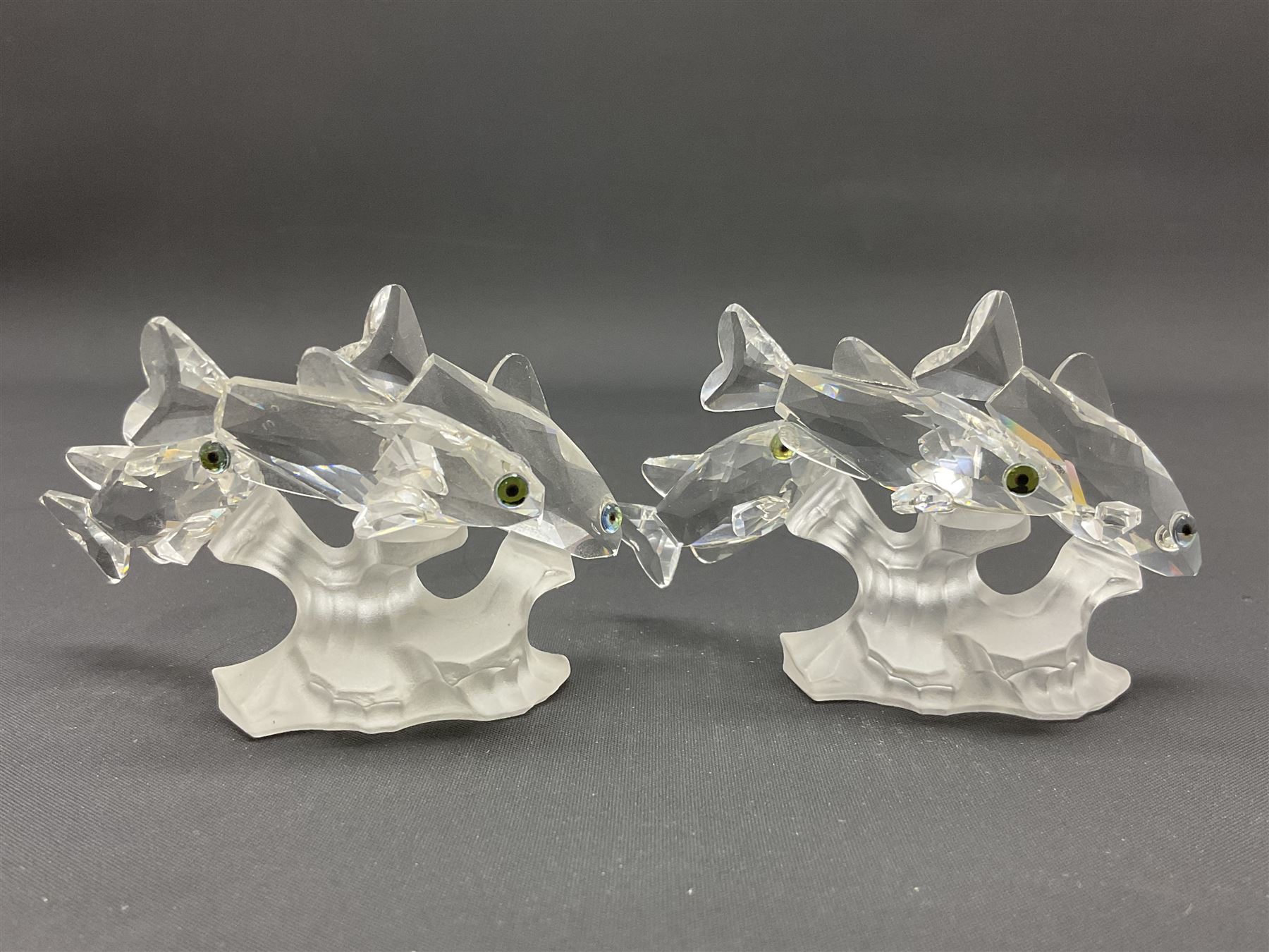 Swarovski Crystal sea creatures, comprising lion fish and dolphin, both with coloured elements, together with two seahorses, two small fish groups, butterfly fish, longnose butterfly fish and six coloured shells, tallest H8.5cm