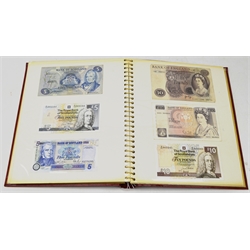  Collection of forty-nine Great British banknotes including three O'Brien series A ten shilling notes, three Beale one pound notes prefix 'L05C', 'C78J' and 'J35J, six page one pound notes, twelve Somerset one pound notes, O'Brien series B five pound note prefix 'H06', eight Page five pound notes all prefix '60E', various Scottish banknotes etc, in red album, face value over one hundred and twenty pounds  