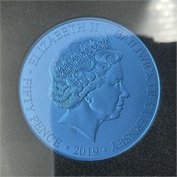 Queen Elizabeth II Bailiwick of Guernsey 2019 'The Titanium Moonlanding' fifty pence three coin set, comprising 'Green', 'Orange' and 'Blue' titanium coins, in capsules and case with certificate