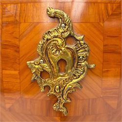 20th century Louis XV design serpentine commode, the rectangular breccia marble top with a rounded moulded edge and projecting corners, above a bombe bombe-shaped kingwood and parquetry design front of two short and two graduated drawers with rococo style handles, corners with gilt-bronze foliate mounts on short cabriole form feet with gilt bronze sabots  