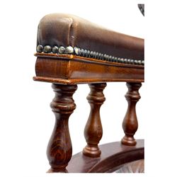 Mahogany framed swivel Captains desk chair, upholstered in brown buttoned leather, turned supports and swivel base on castors