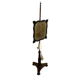 Early 19th century pole screen, tapestry glazed panel in scroll and foliate carved frame, turned and lobe carved column on platform, compressed turned feet