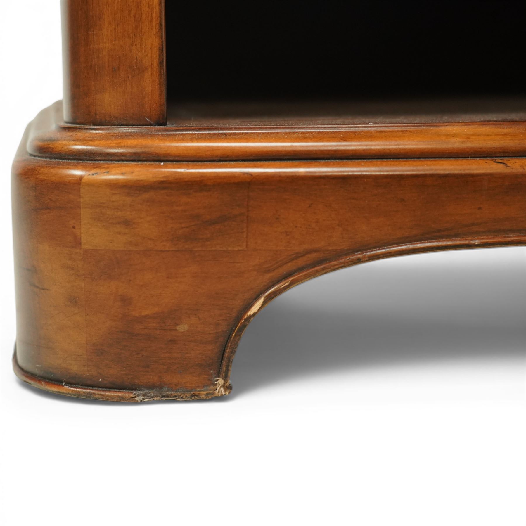 Willis & Gambier - curved sideboard, curved rectangular top, above three frieze drawers with brass pulls over two open recesses, on bracket feet 