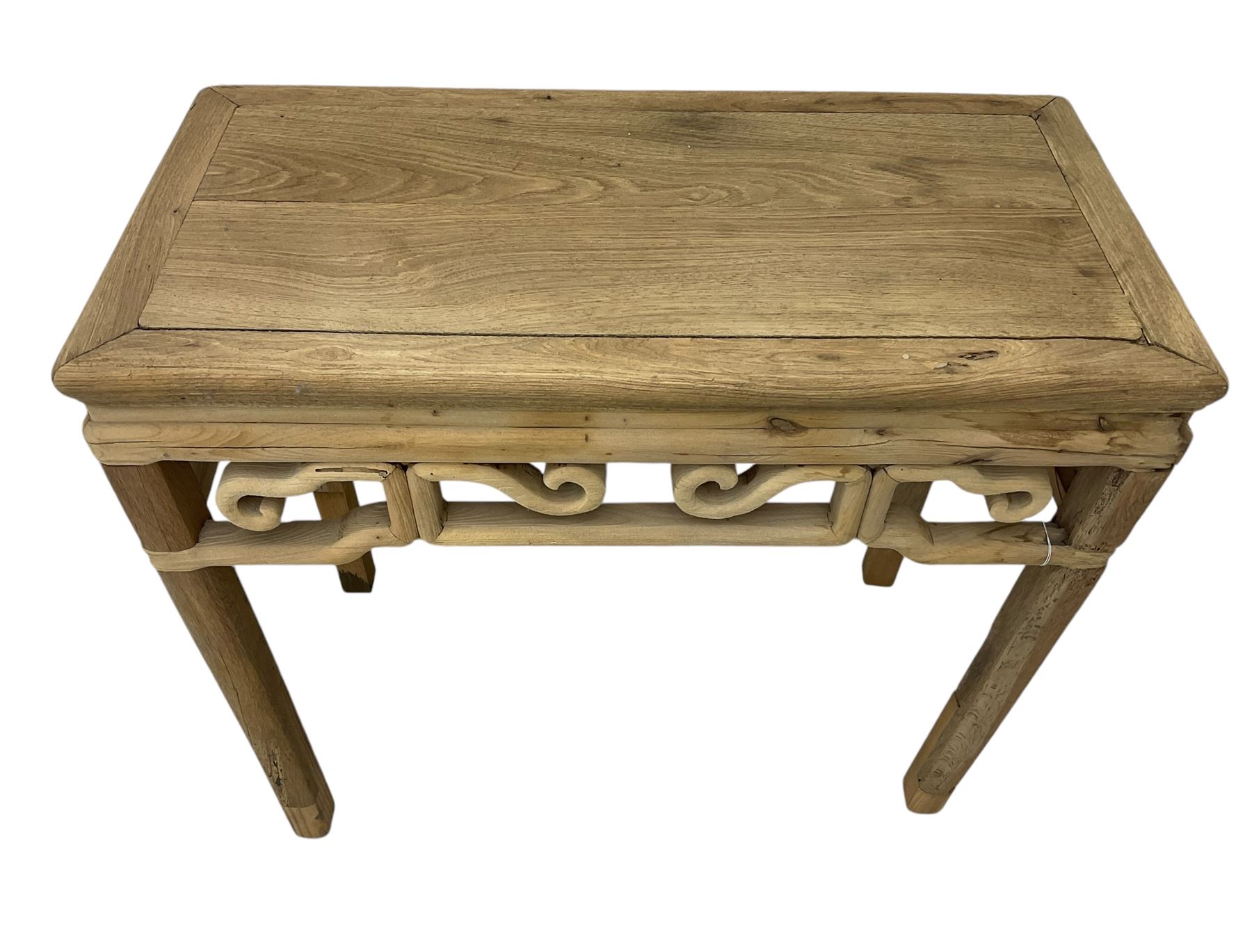 Chinese Ming design elm side table, rectangular top over shaped frieze rails, on square supports with curved outer edge 
