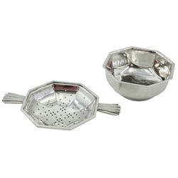 Mid 20th century silver tea strainer and bowl, each of octagonal form, the strainer with twin fan handles, hallmarked William Suckling Ltd, Birmingham 1946, including handles L11cm, approximate weight 2.99 ozt (93 grams)