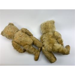 Chiltern Ting-a-Ling teddy bear c1950s with blond mohair body, swivel jointed head with glass eyes and vertically stitched nose and mouth, jointed limbs with velvet pads and card lined feet and internal chimes H14
