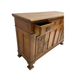 Late 19th century walnut side cabinet, rectangular moulded top over three drawers and three cupboards, fluted uprights, on block feet