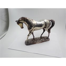  Silver model of a Racehorse designed by David Geenty, Camelot Silverware Ltd, 1998 (filled) H17cm x W22.5cm   