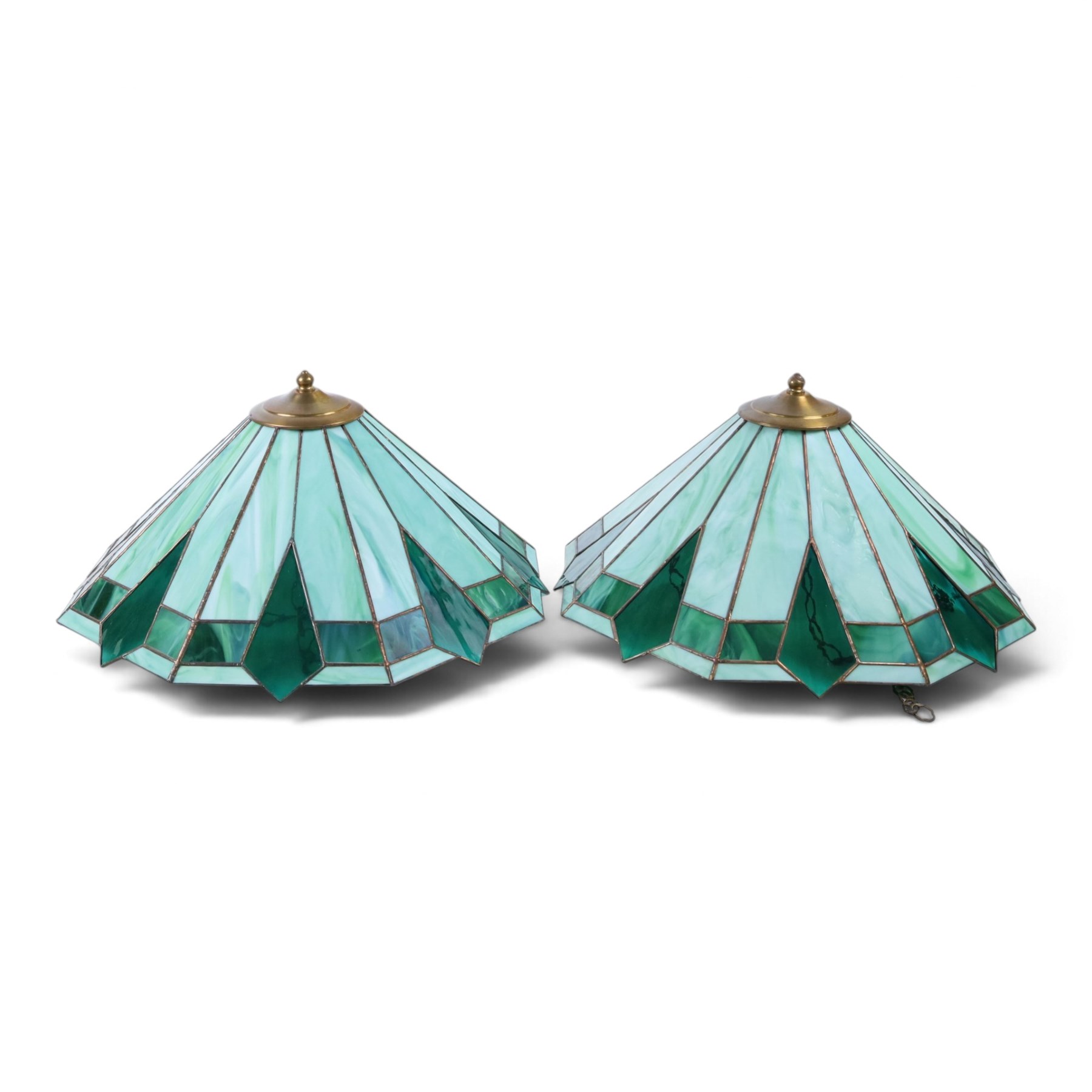 Pair of Tiffany style green stained glass shades with geomatic design, D50cm