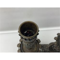 Pair of late 19th/ early 20th century brass candlesticks in the form of dolphins upon a stepped base with Fleur-de-lis design, H32cm 