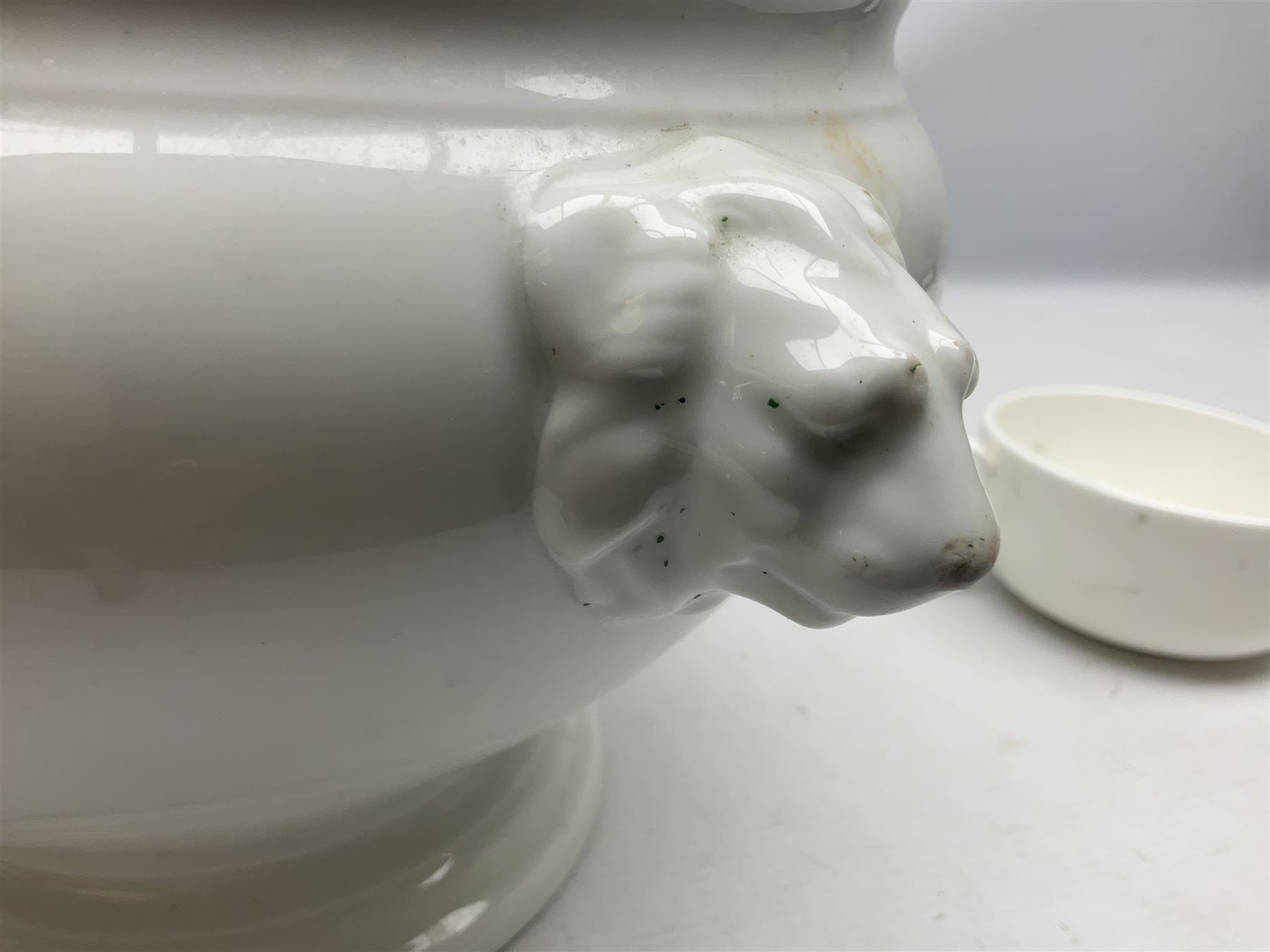 Thun WW2 German Luftwaffe officer's mess plain white glazed soup tureen with lion mask handles, marked with the Luftwaffe eagle beneath and dated 1939 L31cm; together with Waffen 'SS' white glazed twin handled soup bowl, marked beneath Bauscher Weiden 1942 (2)