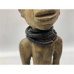 Early 20th century West African Yoruba family wooden figure of Orisha Oko, the god of farming/agriculture, carved from the solid, bears manuscript label of provenance verso H26.5cm