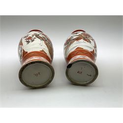 A pair of Japanese Kutani vases, of baluster form decorated with panels of birds and flowers, each with marks beneath, H30cm. 