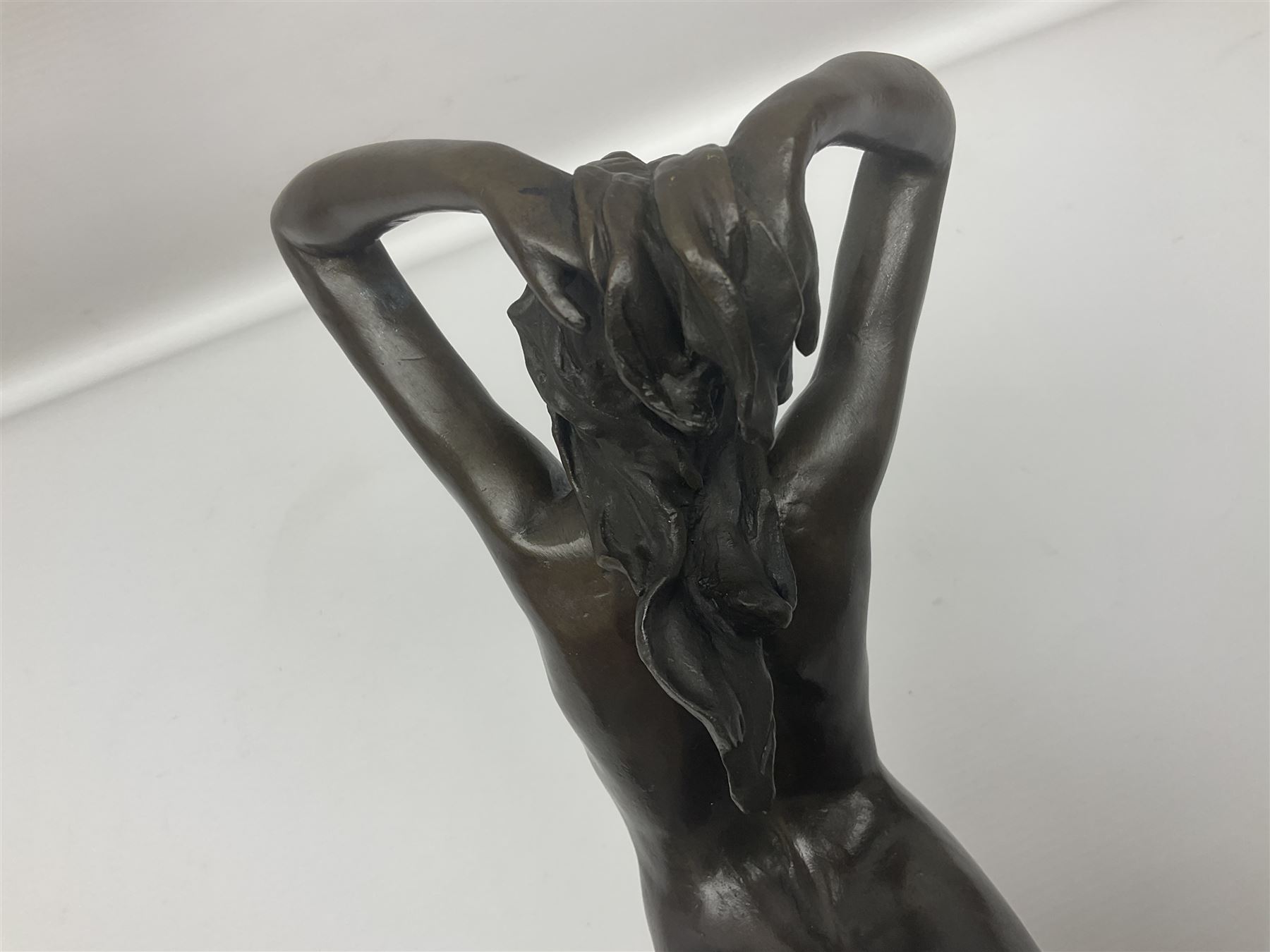 After Joseph Michel Ange Pollet, bronze nude figure of a woman, upon an oval marble base, H46cm