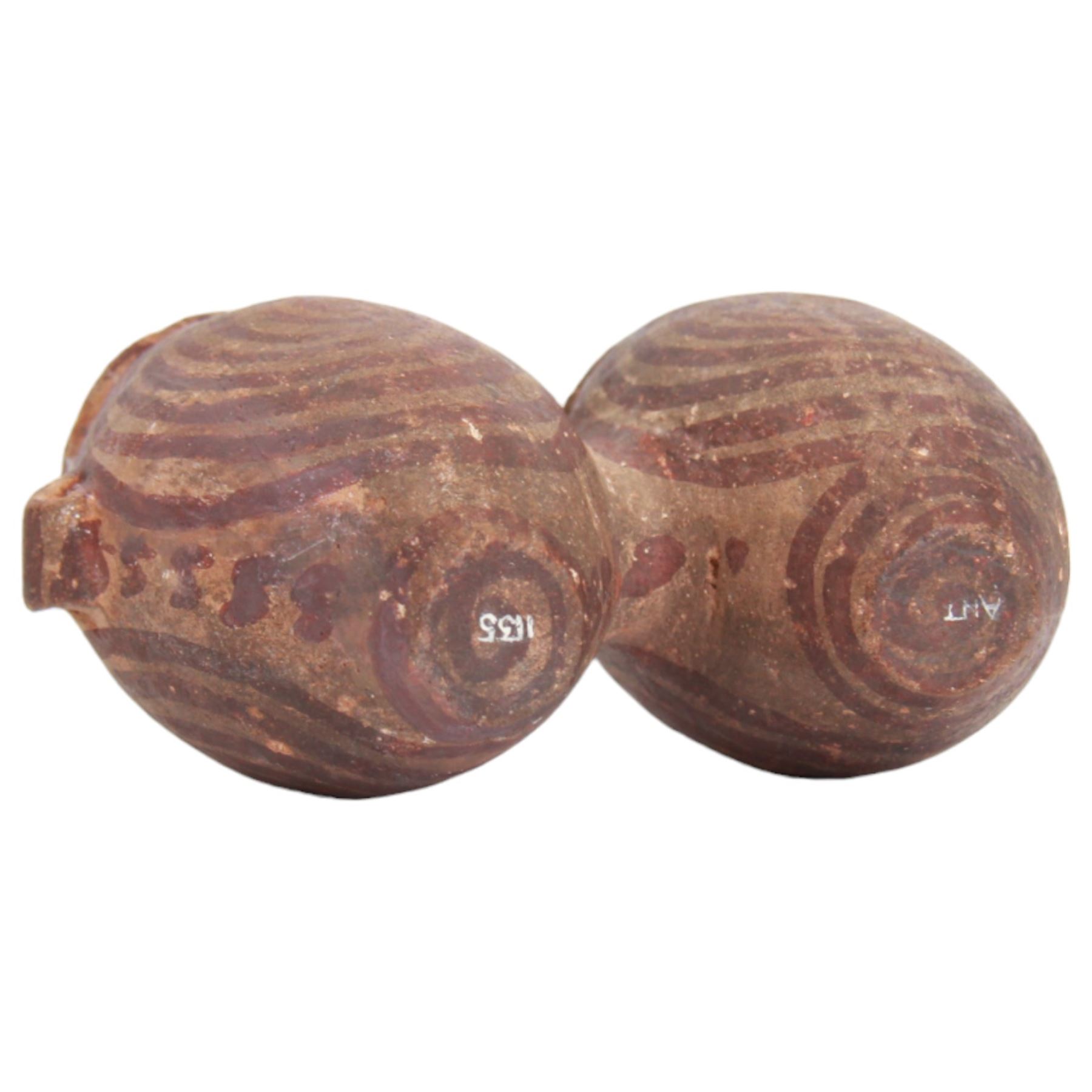 Miniature Egyptian pottery double-bodied jar, Predynastic Period, the two conjoined jars of ovoid form, each with pierced lug handle, and painted with spirals, tapering to flat bases, bearing Sotheby's label, H6cm W10cm
