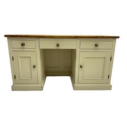 Rustic waxed pine and painted pedestal desk or sideboard, rectangular top over three drawers and two panelled cupboards, on plinth base