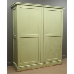  19th century pine double cupboard, paint finish, projecting cornice, two panelled doors enclosing fitted interior, plinth base, W148cm, H172cm, D52cm  