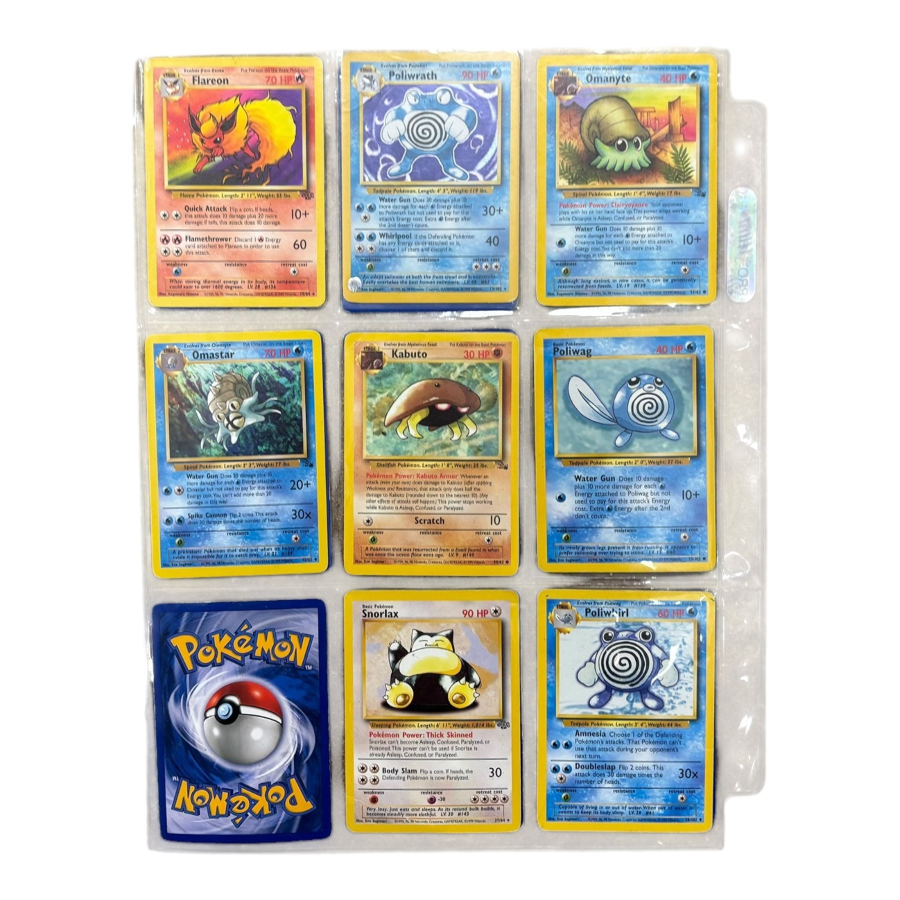 Collection of mainly vintage Pokemon cards including Charizard Base Set Holographic number 4/102 and two Ancient Mew 2000 promo cards, some housed within plastic wallets and some loose