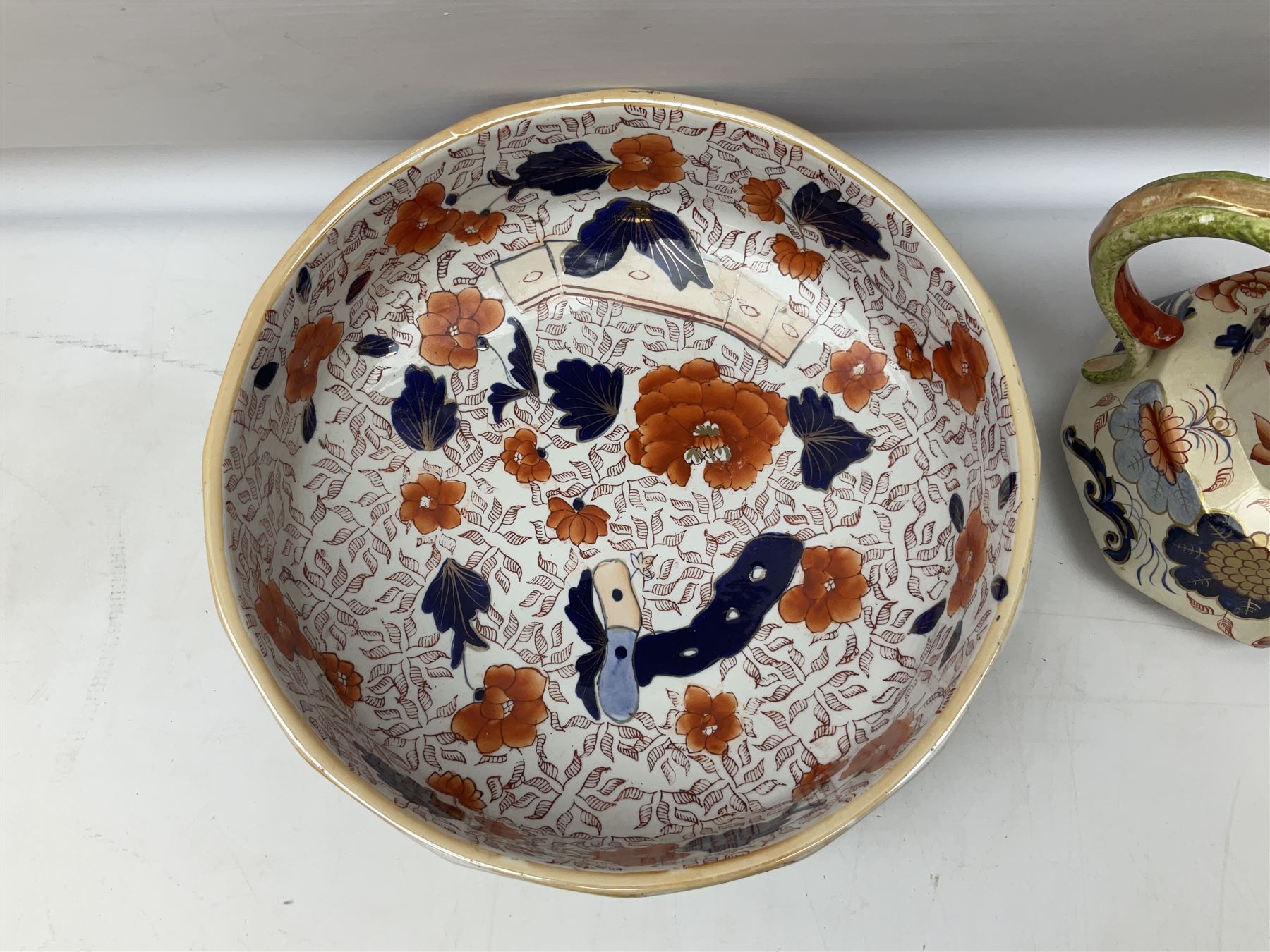 19th century ironstone wash jug and bowl set decorated in the Imari palette, together with two further smaller ironstone jugs similarly decorated, bowl D35cm