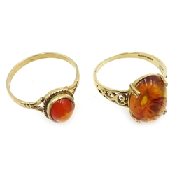 Two 9ct gold Baltic amber rings hallmarked