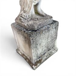 Weathered cast stone garden statue of a 'Shy Maiden', raised on square plinth base