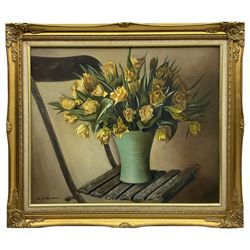 D Valentini (Continental 20th century): Still Life of Yellow Tulips on a Chair, oil on canvas signed 50cm x 60cm