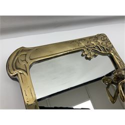 Art Nouveau style mirror in the manner of WMF, decorated with a female figure and floral motifs, the easel support verso with spurious WMF, H35cm
