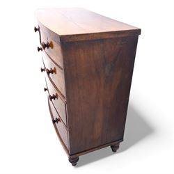 19th century bow front mahogany chest of drawers, rectangular top with moulded edge above an arrangement of two short and three long graduating drawers with turned wooden handles, raised on turned feet