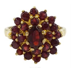 Gold oval and round garnet cluster ring, stamped 9ct