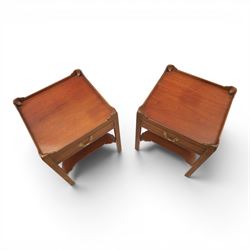 Georgian style pair of mahogany lamp tables, each with three-quarter gallery top above a single frieze drawer with brass swan neck handle, on square tapering supports united by an undertier
