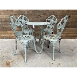 Victorian design cast alloy circular garden table and four cast iron chairs, green painted