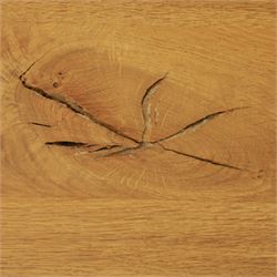 Contemporary light oak dining table, painted tripod bases with stretcher 