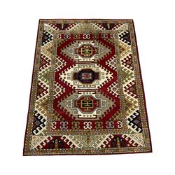 Indo Caucasian rug, red ground field with three medallions, all over geometric design 