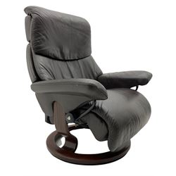 Ekornes Stressless - swivel reclining armchair with adjustable headrest, upholstered in cocoa brown leather, with matching footstool