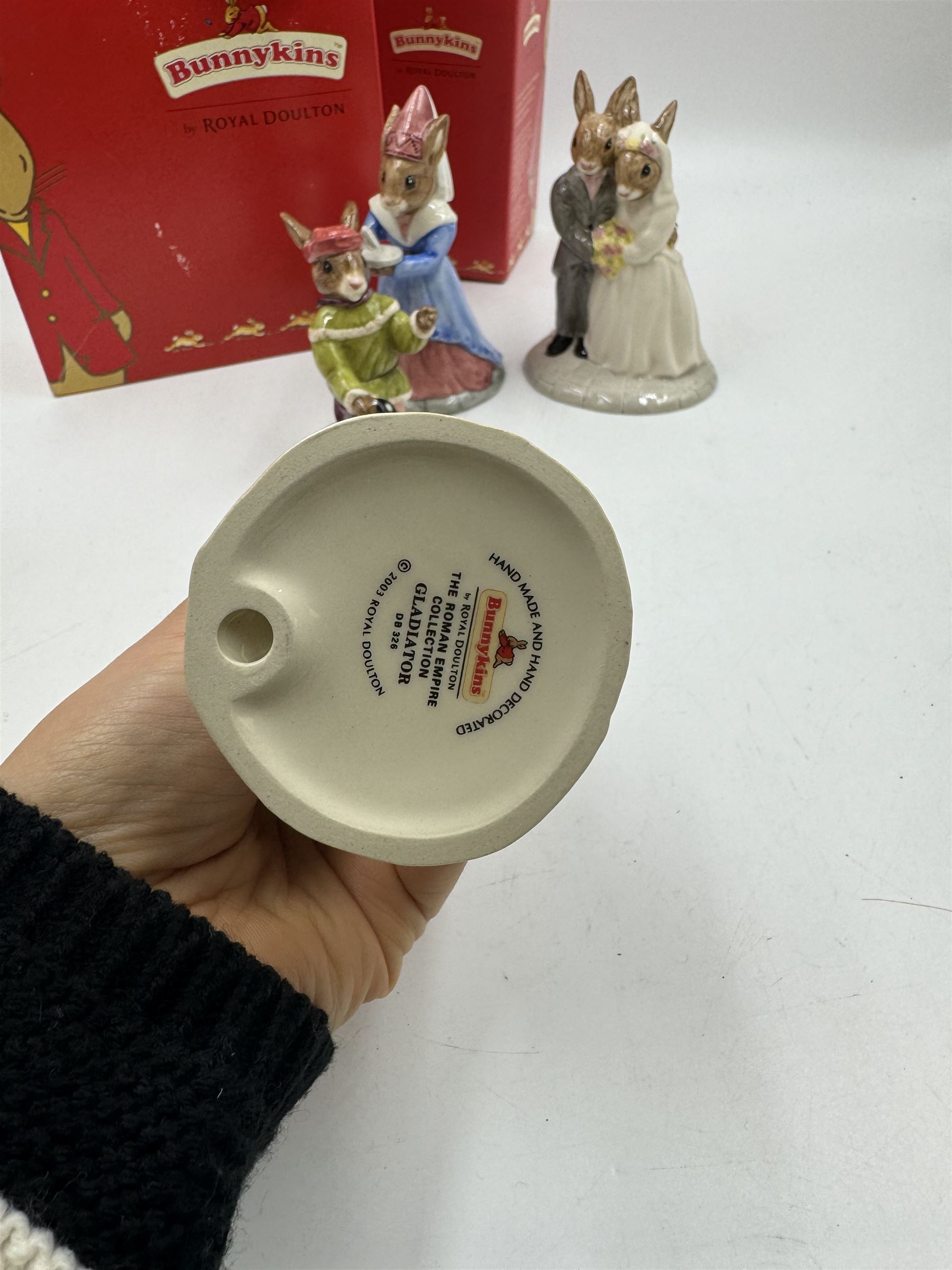 Five Royal Doulton Bunnykins comprising Sundial, Wedding Day, Gladiator, Romeo and Juliet 