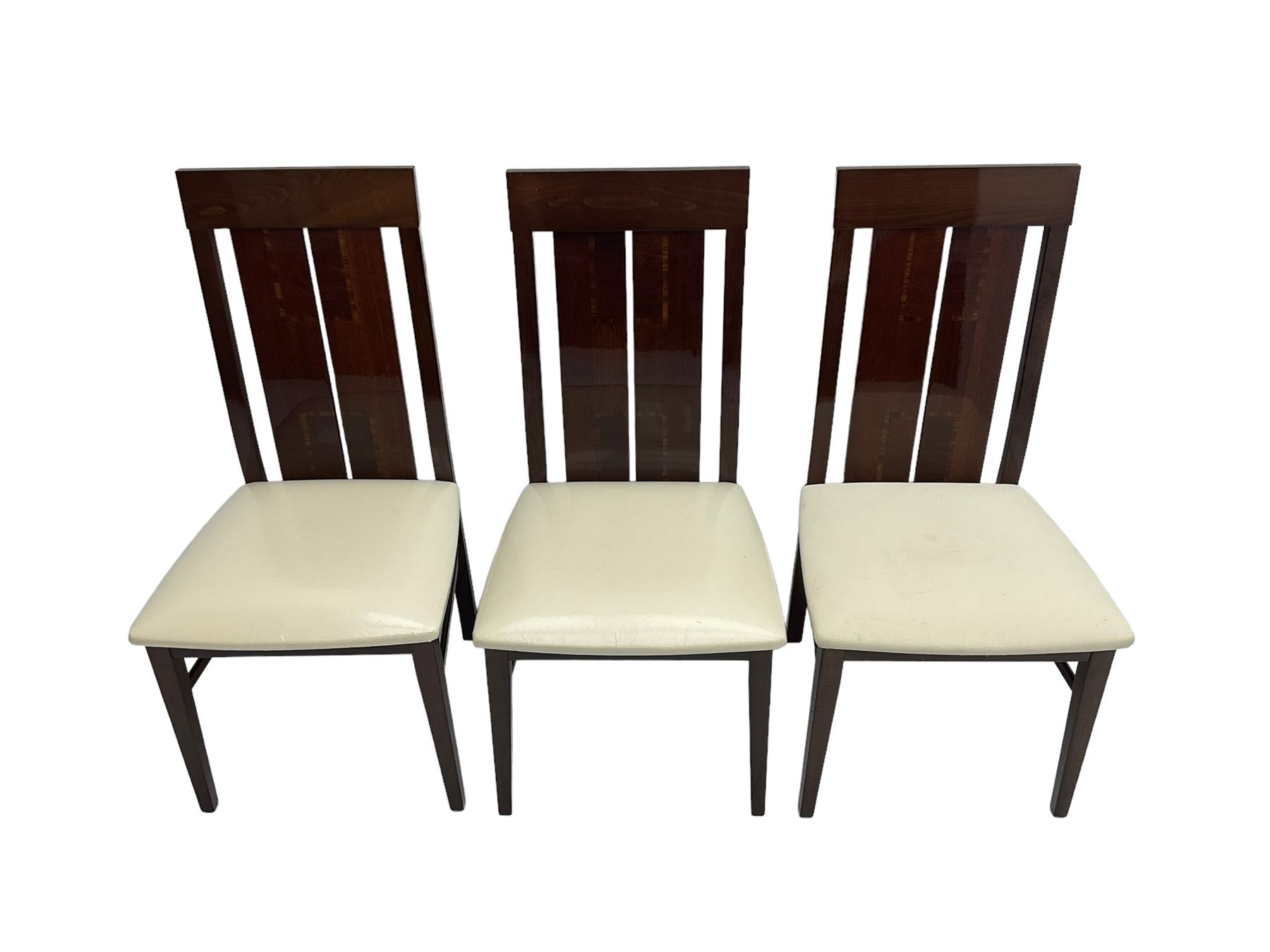 Large American walnut rectangular dining table on square block supports, together with set eight high back dining chairs with cream upholstered seats, the top and chair backs with matching inlaid geometric banding